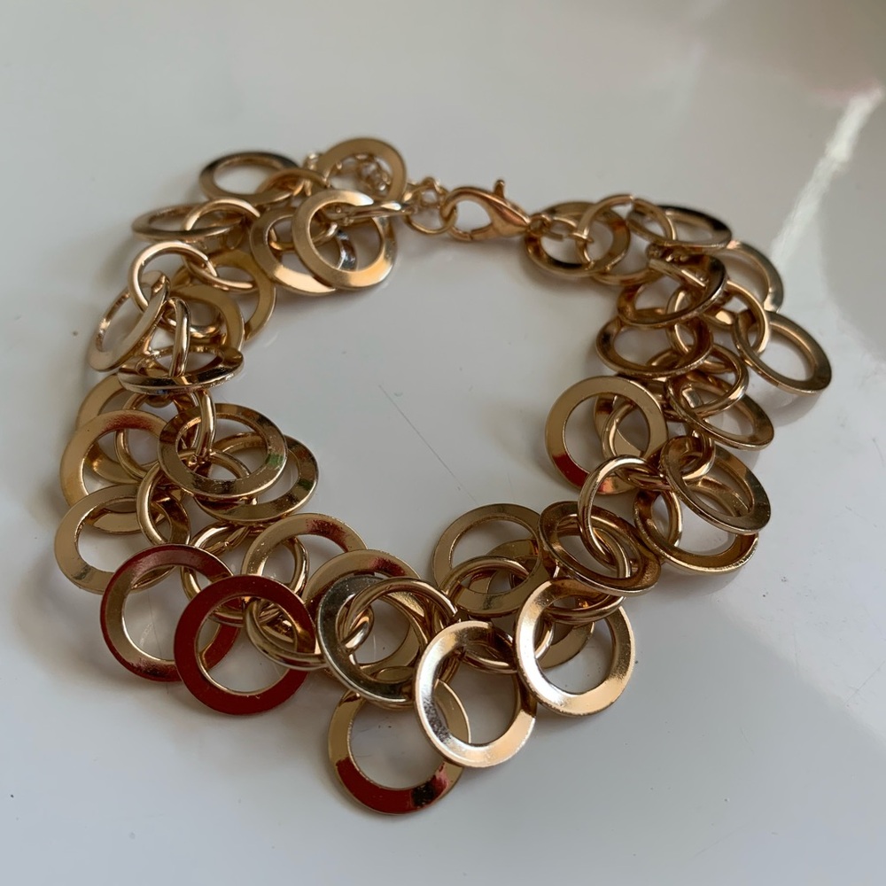 Goldtone Paparazzi linked hoops bracelet
